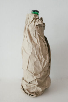 Beer Bottle Inside Paper Bag