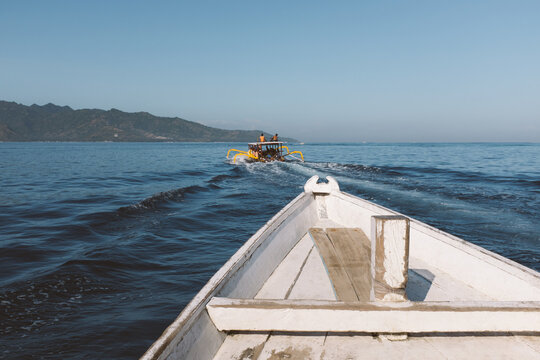 Travelling by boat to a tropical island