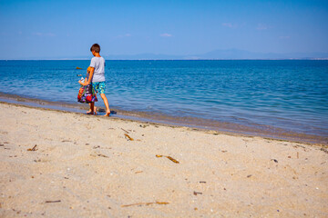 Child on the holiday enjoy at beach