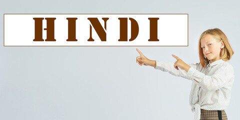 Teenage girl pointing her fingers at text - HINDI