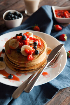Pancakes with strawberries and bluberries