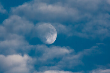 Moon peeking through the clouds.