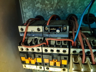 An electrician inspecting the tower crane system.