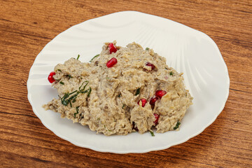 Vagan dietary cusine - mutabal with granet seeds