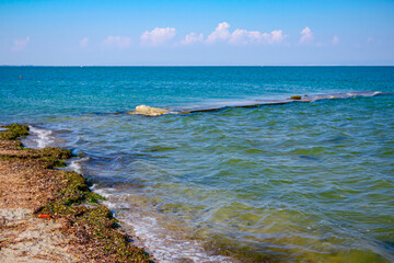Long stone reef over Mediterranean sea