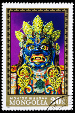Stamp printed by Mongolia, shows Traditional ritual mask of three-eyed God Chagdar-wrathful deity symbolizing strength and destroys ignorance, circa 1971