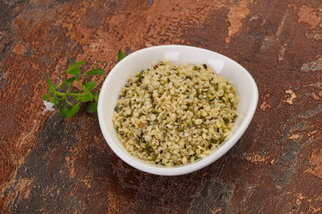 Peeled hemp seeds in the bowl