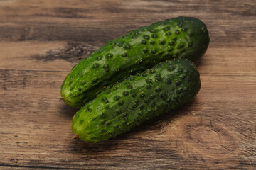 Ripe fresh green two cucumbers
