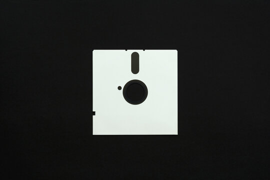 White 5&Ocirc;&oslash;&Omega;_-inch diskette on black