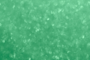 blurred bokeh of glitter festive background for your project toned