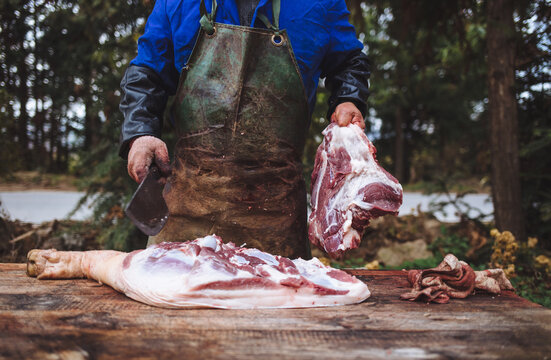 Cutting pork in a village of China