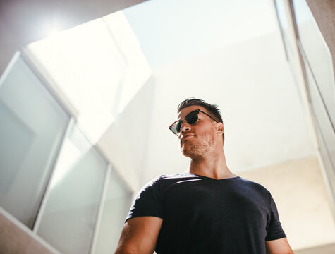 Man looking looking out with glasses