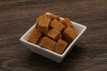 Cane sugar cubs in the bowl