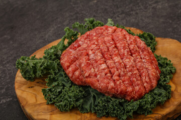 Raw beef burger cutlet for cooking