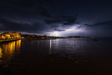 Lightning bolt over port of Cagliari, Italy