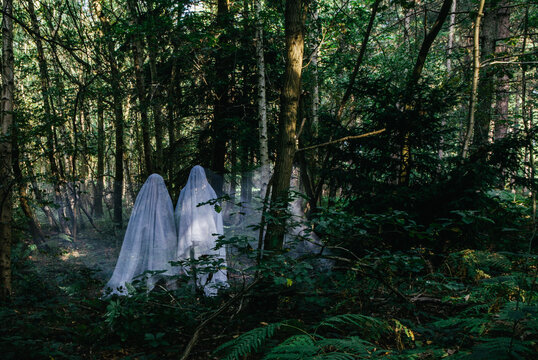 Halloween ghosts in the woods