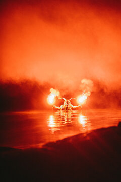 krampus with bengal light in water