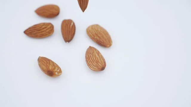 A large amount of almonds fall.