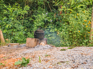 Steel old pot on Pha Ngeun in vangvieng City Laos.Vangvieng City The famous holiday destination town in Lao.