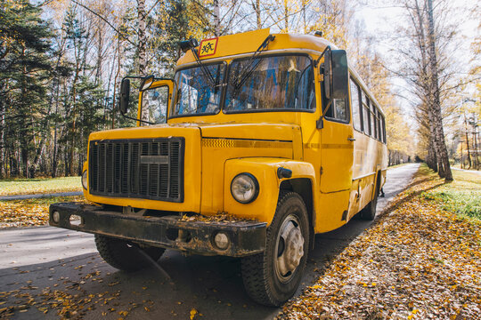 Yellow school bus parked along the street