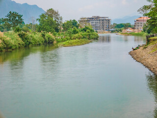 Beautiful view of nam song river with mountain view at Vangvieng city Lao.Vangvieng City The famous holiday destination town in Lao.