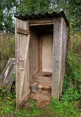 Fototapeta na wymiar old wooden outdoor toilet
