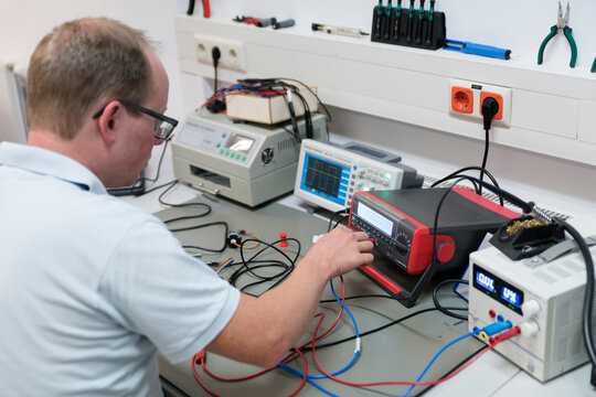 Young technican working in lab