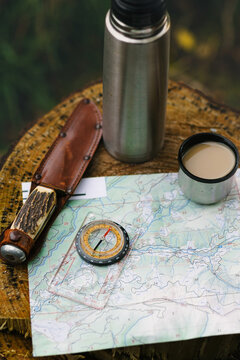 Plotting a trail on a map, while having a coffee break.