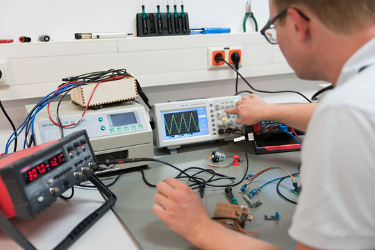 Young technican working in lab