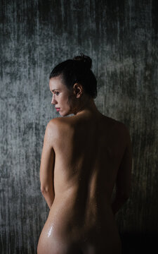 Back view of beautiful woman naked body after shower