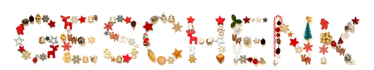 Colorful Christmas Decoration Letter Building German Word Geschenk Means Gift. Festive Ornament Like Christmas Tree, Star And Ball. White Isolated Background