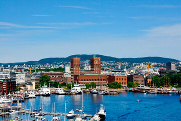Fototapeta na wymiar Oslo. Norway. The view from the sea. Oslo is a major port and capital of Norway. Located deep in the easy-to-navigate Oslo fjord.