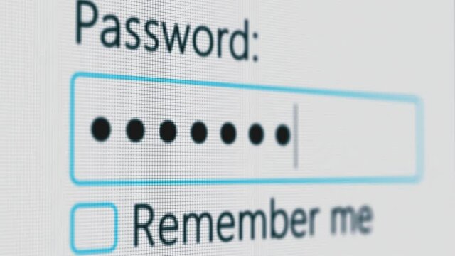 Password Entry. Someone entering their password on a computer screen. Log in to your account. Typing password on Login page