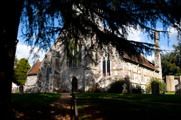 Fototapeta na wymiar All Saints parish church in the Church of England diocese of Salisbury, building dating back to circa 1190
