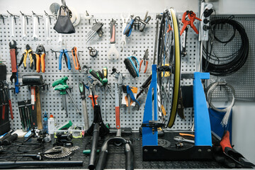 Bicycle workshop interior, tools on the wall