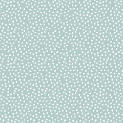 Seamless background with random elements. Abstract ornament. Dotted abstract light blue and white pattern