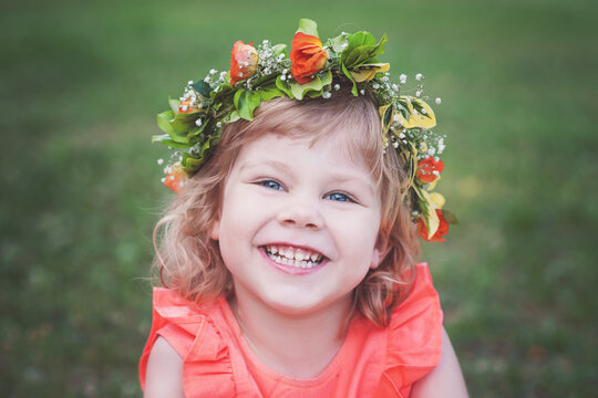 Portrait of a beautiful, happy little girl