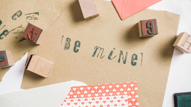 Be Mine"" Written with Stamps on the Valentine's Day Card