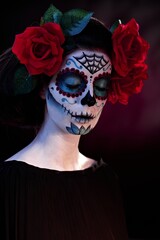 Woman in Halloween makeup - mexican Santa Muerte mask.