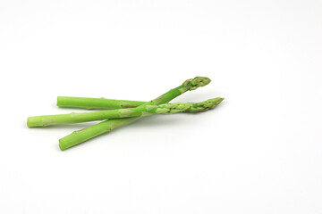 Green asparagus on a white background