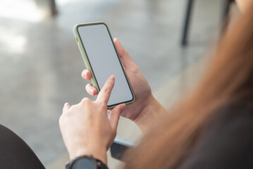 Close up of woman using mobile smart phone.