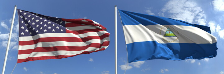 Flying flags of the USA and Nicaragua on high flagpoles. 3d rendering