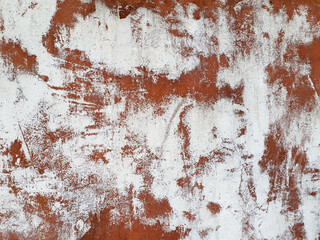 Old plaster texture. White red brown cement wall.