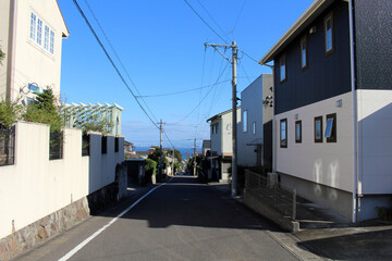 Fototapeta na wymiar Housing or residential area overlooking the sea around Beppu