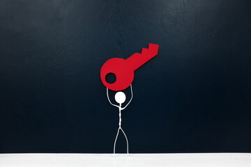 Stick man figure carrying a big red key in dark background with copy space. Key to success and finding solution concept.