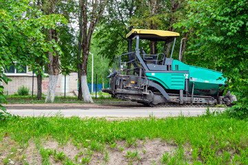 Obraz premium Road asphalt paving equipment, road repair.