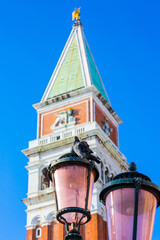 Fototapeta na wymiar Campanila and street lantern