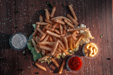 french fries on wood background