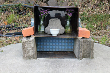 Japanese devotion or worship on stone