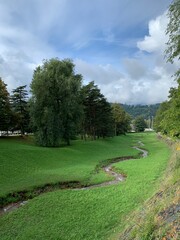 River going through the village of Levico, Italy